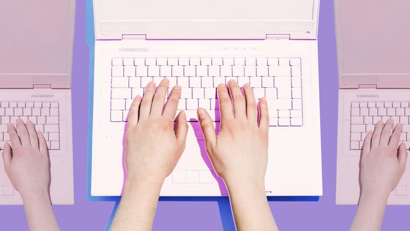 Fast Company Executive Board - Company executive types article on keyboard