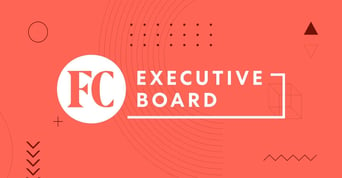 Fast Company Executive Board - Hand of visionary leader writing an article
